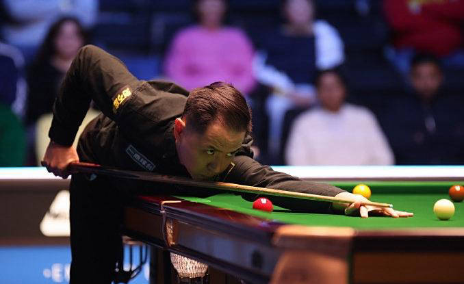 我国的丁俊, 梅晋级下一